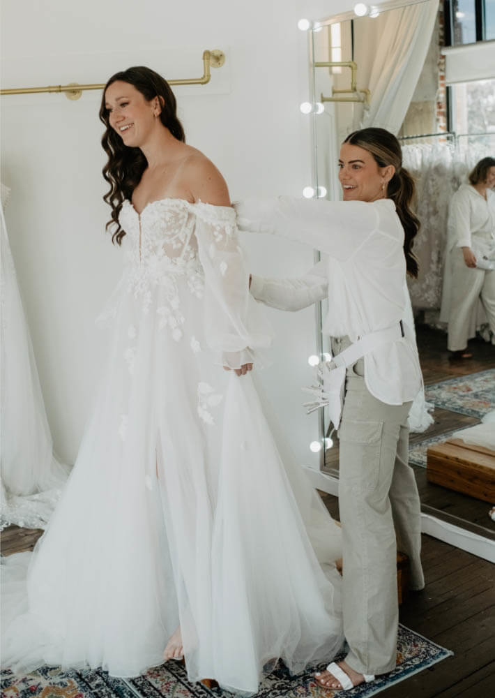 Model wearing a white gown